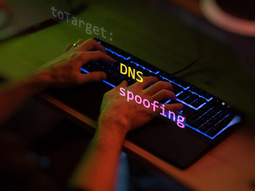 How does a DNS spoofing attack work?